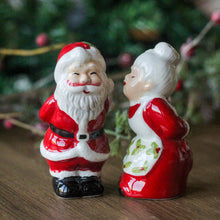 Load image into Gallery viewer, Ceramic Kissing Mr & Mrs Clause Salt and Pepper Set
