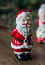 Load image into Gallery viewer, Ceramic Kissing Mr & Mrs Clause Salt and Pepper Set