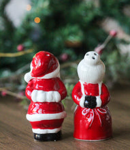 Load image into Gallery viewer, Ceramic Kissing Mr & Mrs Clause Salt and Pepper Set