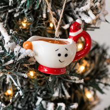 Load image into Gallery viewer, Happy Ceramic Gravy With Santa Hat Ornament - Derbyshire Gift Centre
