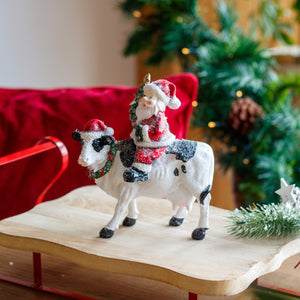 Resin Santa On A Cow Christmas Decoration