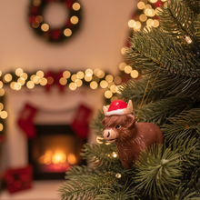 Load image into Gallery viewer, Ceramic Highland Cow With Santa Hat Hanging Ornament
