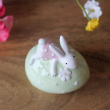 Load image into Gallery viewer, Ceramic Bunny On Green Spotty Egg Ornament
