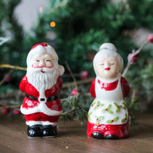 Load image into Gallery viewer, Ceramic Kissing Mr &amp; Mrs Clause Salt and Pepper Set
