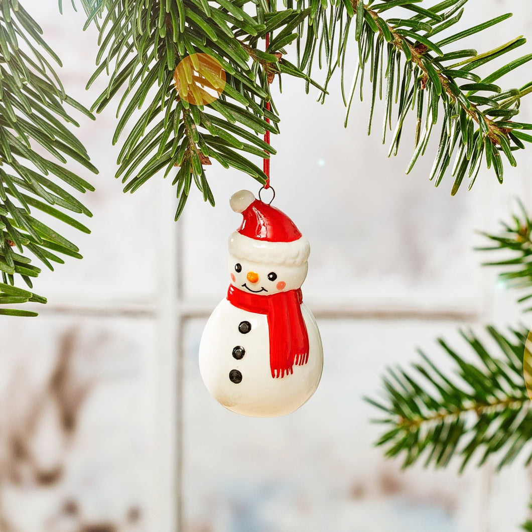 Sass & Belle Ceramic Snowman With Carrot Nose, Rosy Cheeks & Santa Hat Christmas Tree Ornament