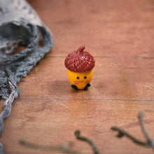 Load image into Gallery viewer, Handblown Glass Smiling Acorn Ornament
