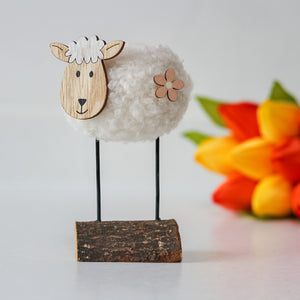 Woolly Sheep On Log