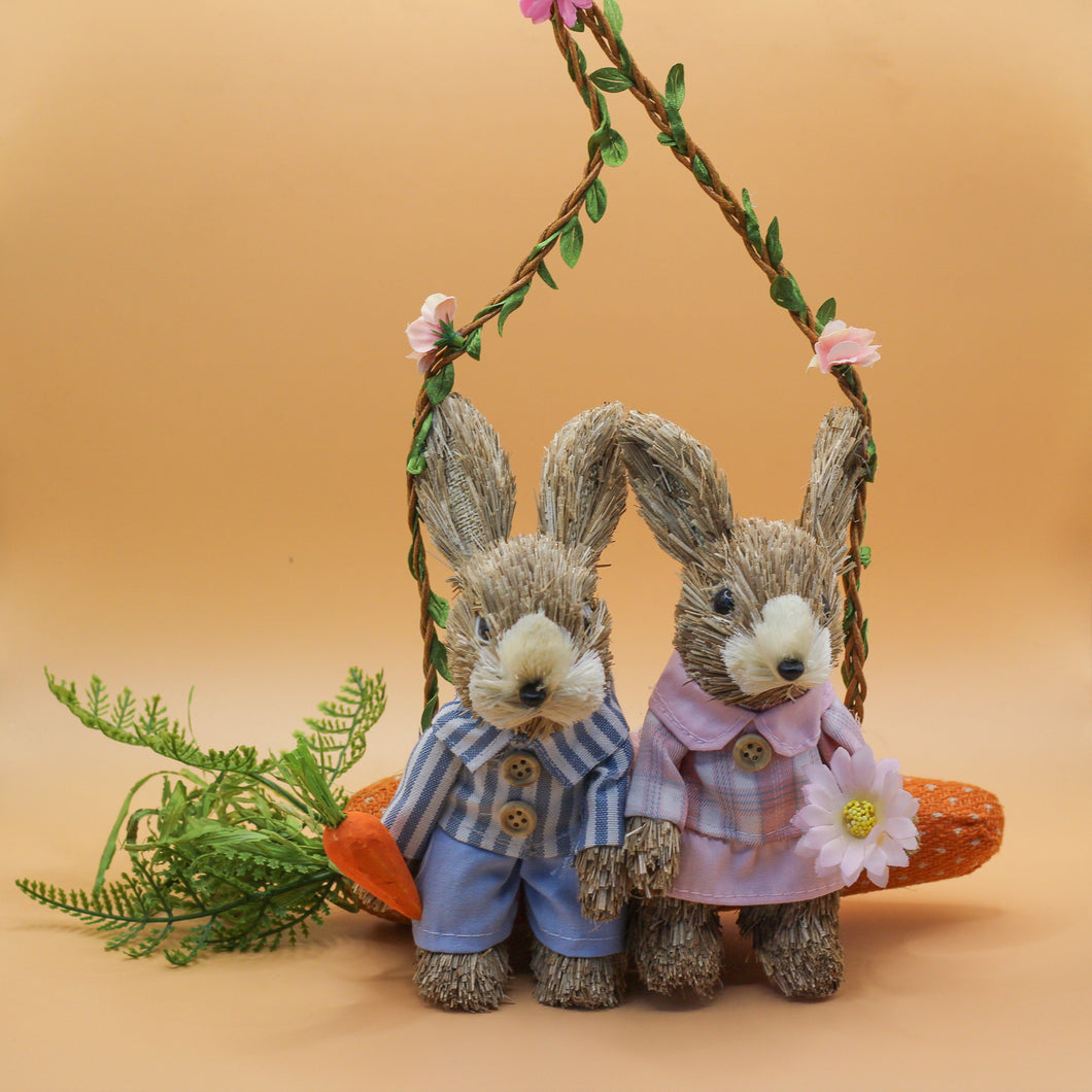 Bristle Bunnies Hanging On Carrot Swing